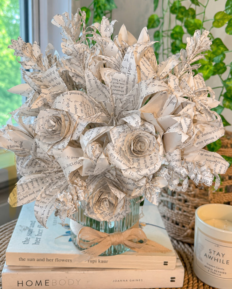 “A forever bouquet handcrafted from recycled paper and wrapped in nostalgic charm.”